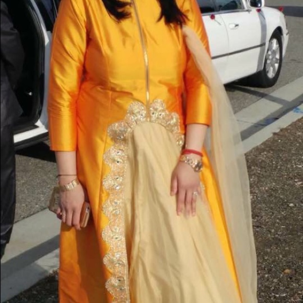 Three piece india lehnga top, skirt and dupatta.